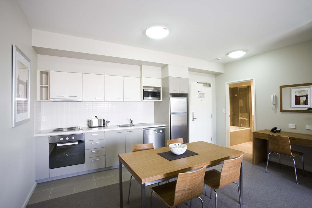 Gladstone Downtown Central Apartment Hotel Official Ruang foto